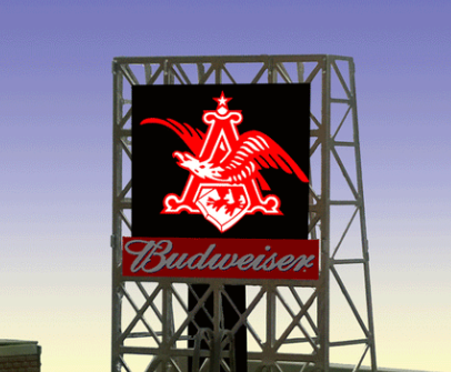 A red and black eagle billboard on a Budweiser beer signpost.