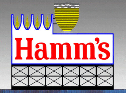 A model train accessory sign for HAMM'S BEER, featuring a red and blue neon sign with the brand name.