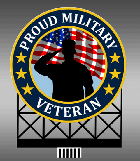A circular lighted billboard sign featuring an image of a soldier with the text 'Proud Military Veteran' and the American flag.