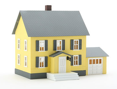 A model of a yellow and gray house with a front porch and figures in the foreground and background.