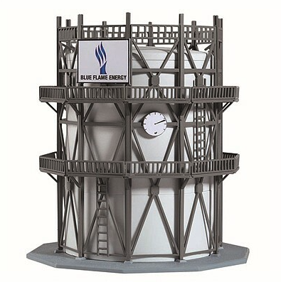 A model of an oil tank building kit, colored in gray, with a clock on the side and a logo on the top, resembling an oil company's branding.