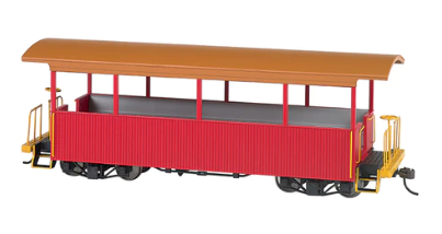 A red and tan Bachmann 26002 On30 excursion car model train component with a tan roof and metal wheelsets.