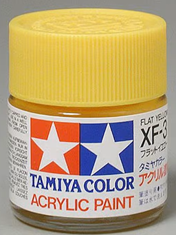 A tube of Tamiya brand acrylic paint in flat yellow color, labeled 'XF-3' which indicates the extra-fine grade, and '23ml' denoting the paint volume.