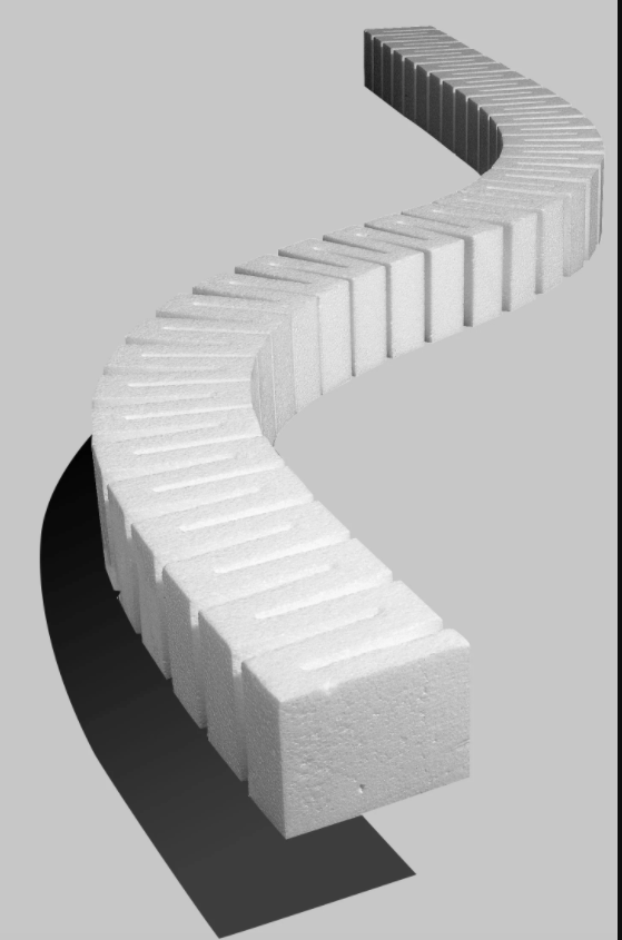 A set of white, 2-inch risers for model train layouts, depicted in a staggered pattern which indicates they are designed for elevation and not flat placement on a track.