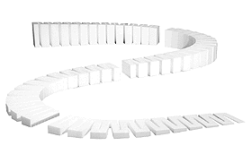 White foam incline set for model train tracks, arranged in a circular pattern.
