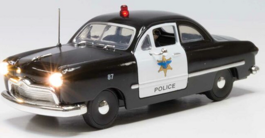 Scale police car with working head and tail lights