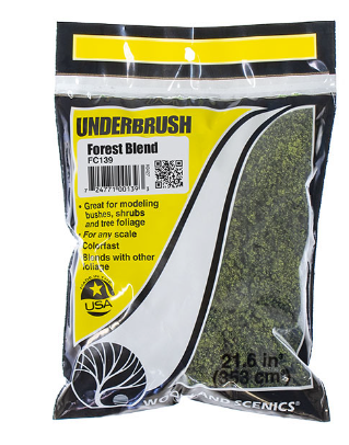 A package of Woodland Scenics Underbrush Forest Blend Bag, used for modeling tree foliage and ground covers in model train setups.