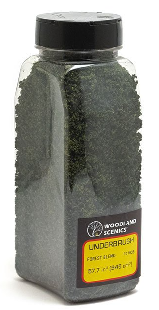 A package of Woodland Scenics model train foliage, specifically designed for medium to large trees and ground covers.