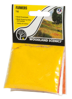 A bag of Woodland Scenics modeling material designed for modeling flowerbeds, trees, bushes, and vines, showing the product in a yellow state.