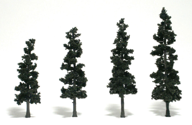 A set of four green conifer trees with detachable bases, intended for model train setups.